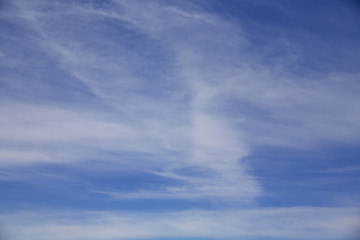 Chemtrail. Reality or conspiracy Theory. Contrails of an airplane against a blue sky. Beautiful blue sky.