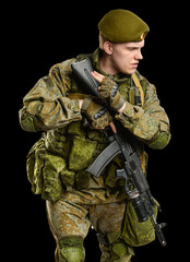 Fototapeta premium Male Russian officer in mechanized infantry uniform isolated with clipping path on black background 
