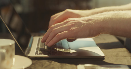 Typing messages on a laptop