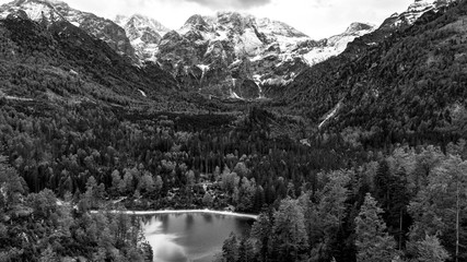 Austrian Alps black and white image, ödsee in austria with mountains in the background