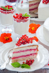 Cakes with red currant decorated with fresh red berries