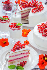 Cakes with red currant decorated with fresh red berries