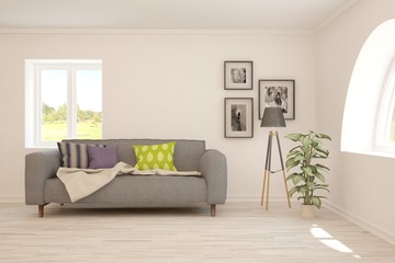 White living room with sofa. Scandinavian interior design. 3D illustration