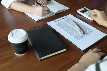 Woman talking with colleague about new startup project.Business people brainstorming concept.