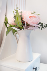 Close up of pink roses in interior. Close up