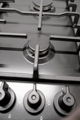 Close up of Kitchen gas stove in the kitchen. Black