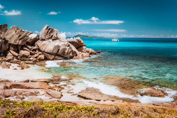 Grand L Anse, La Digue, Seychelles. Tropical coastline with hidden beach, unique granite rocks and...