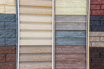 Siding made in the texture of wood samples close-up