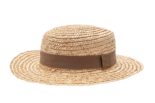Boater straw hat isolated shot in the Studio. Concept of fashion clothing accessories and beach holidays
