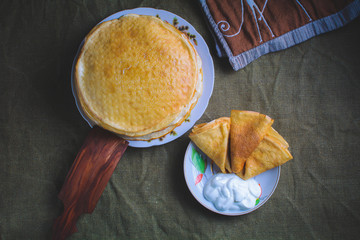 traditional pancakes, homemade pastries with sour cream
