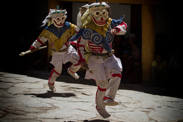 Llamas in a sacred dance in Tibet. Dance tsam.