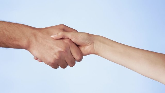 Closeup of hand shake of nude man and woman on white background isolated. Woman and man hands greeting