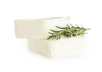 Tasty feta cheese with herbs on white background