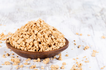 Soy protein textured on old wooden