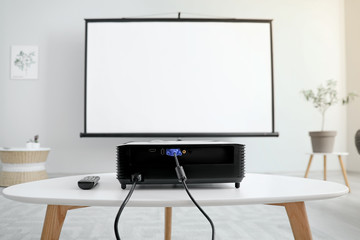 Modern video projector in room