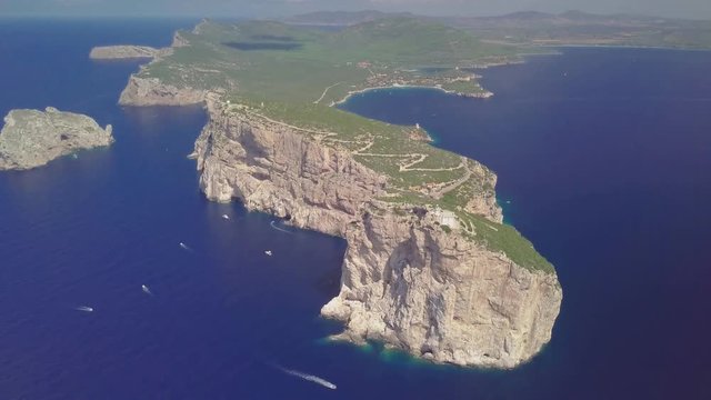 Aerial view of Capo Caccia Sardinian cliff with a lighthouse on the top 