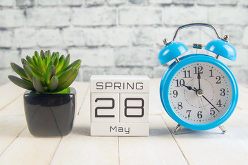 May 28 on the wooden calendar.The twenty-eighth day of the spring month, a calendar for the workplace. Spring