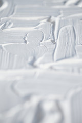 Acrylic white paint close-up. Texture background