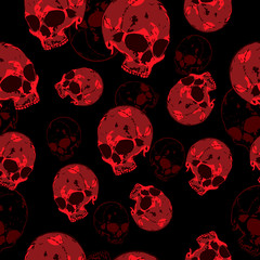 Scary seamless background with skulls.