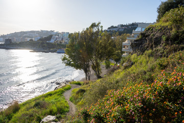 Panoramic view of the beaches of Almuñécar (in Granada, Spain) at sunset