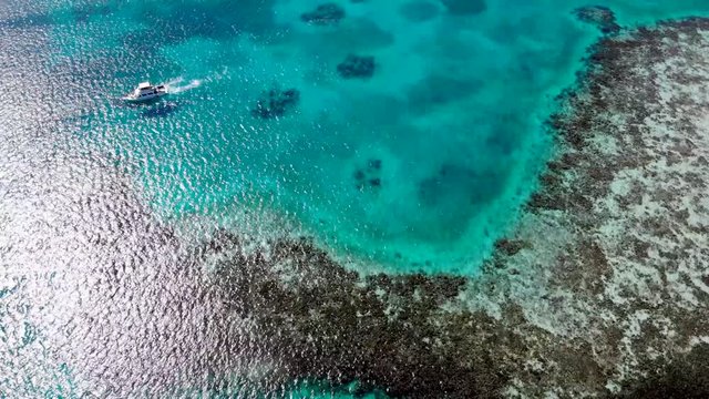 aerial view of  Blue hole and Belize barrier coral reef.