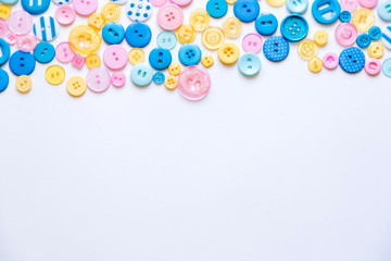 Flat lay with colorful sewing buttons, mock up, top view.