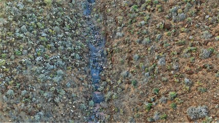 Sunset between mountains and ravines