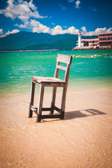 Wooden chair stands at sea, China