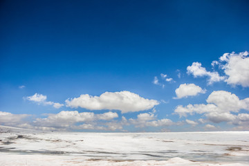 high mountains covered with snow and ice, peaks and valleys in the Caucasus