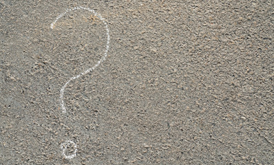 Fototapeta na wymiar question mark with chalk on asphalt
