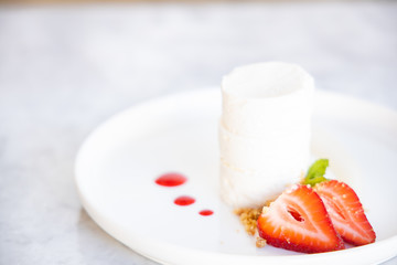 Cheesecake with piece of Strawberry