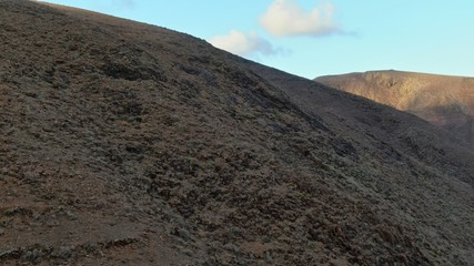 Sunset between mountains and ravines
