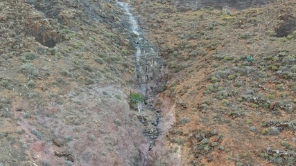 Sunset between mountains and ravines