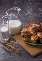 morning glass of milk and rolls for Breakfast. Bakery.