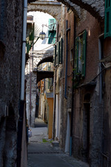 very narrow street in typical Ligurian village 
