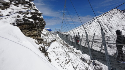 walkway between mountains