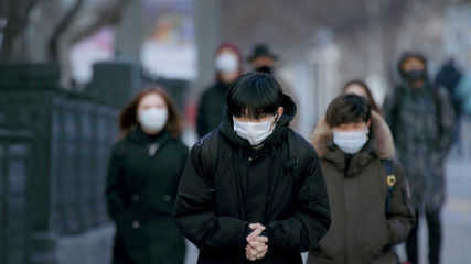 Corona Virus Flu. Wear Respiratory Protect Face Mask. City Street Crowd Walk real. Pandemic...