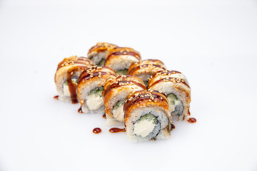 Japanese cuisine. Sushi roll on white background.