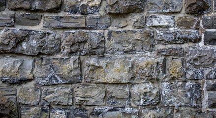texture of old stone wall - rock bricks background