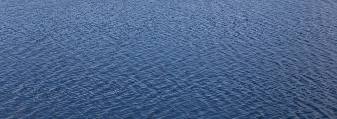 Fototapeta na wymiar texture of blue sea water surface background 