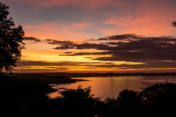 Fototapeta na wymiar Colorful sunrise in Anchieta, State of Espirito Santo, Brazil