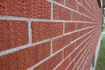 Leading brick lined wall