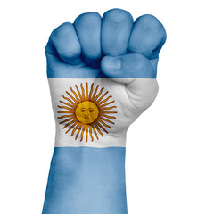 A restrained image of a fist painted in the colors of the flag of Argentina. Image on a white...