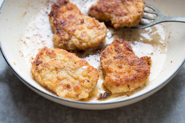 Kotlet schabowy - fried polish bread crumbs coated pork chops 