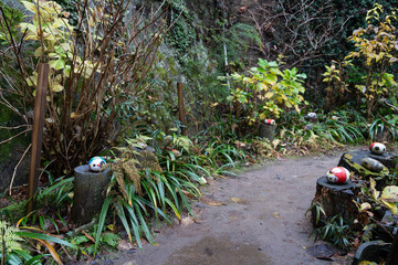 Neko-no-Hosomichi Cat Alley in Onomichi City. Lots of real and ornamental cats (fukuishi-neko), quaint cafes and galleries on this narrow street. Hiroshima Prefecture, Japan