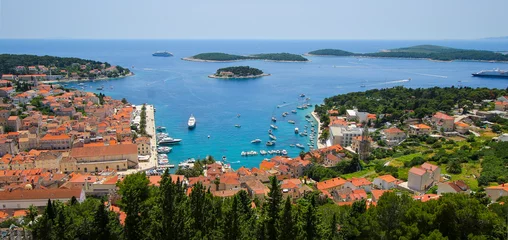 Fotobehang Panoramic aerial view of the old port of Hvar in Croatia - Traditionnal village on Hvar island in the Adriatic Sea © Alexandre ROSA