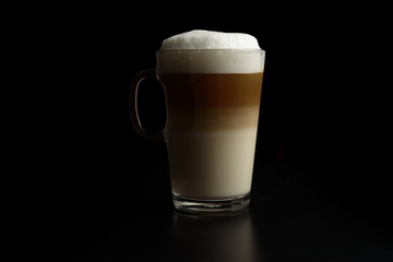 cup of latte coffeeon a glass mug