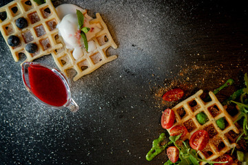 Fresh baked sweet and salty Belgian waffles, top down view. Savory waffles. Breakfast concept