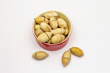 Ripe pecan isolated on white background