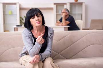 Old couple having argument at home
